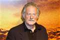 Lord Of The Rings star Elijah Wood remembers ‘our king’ Bernard Hill